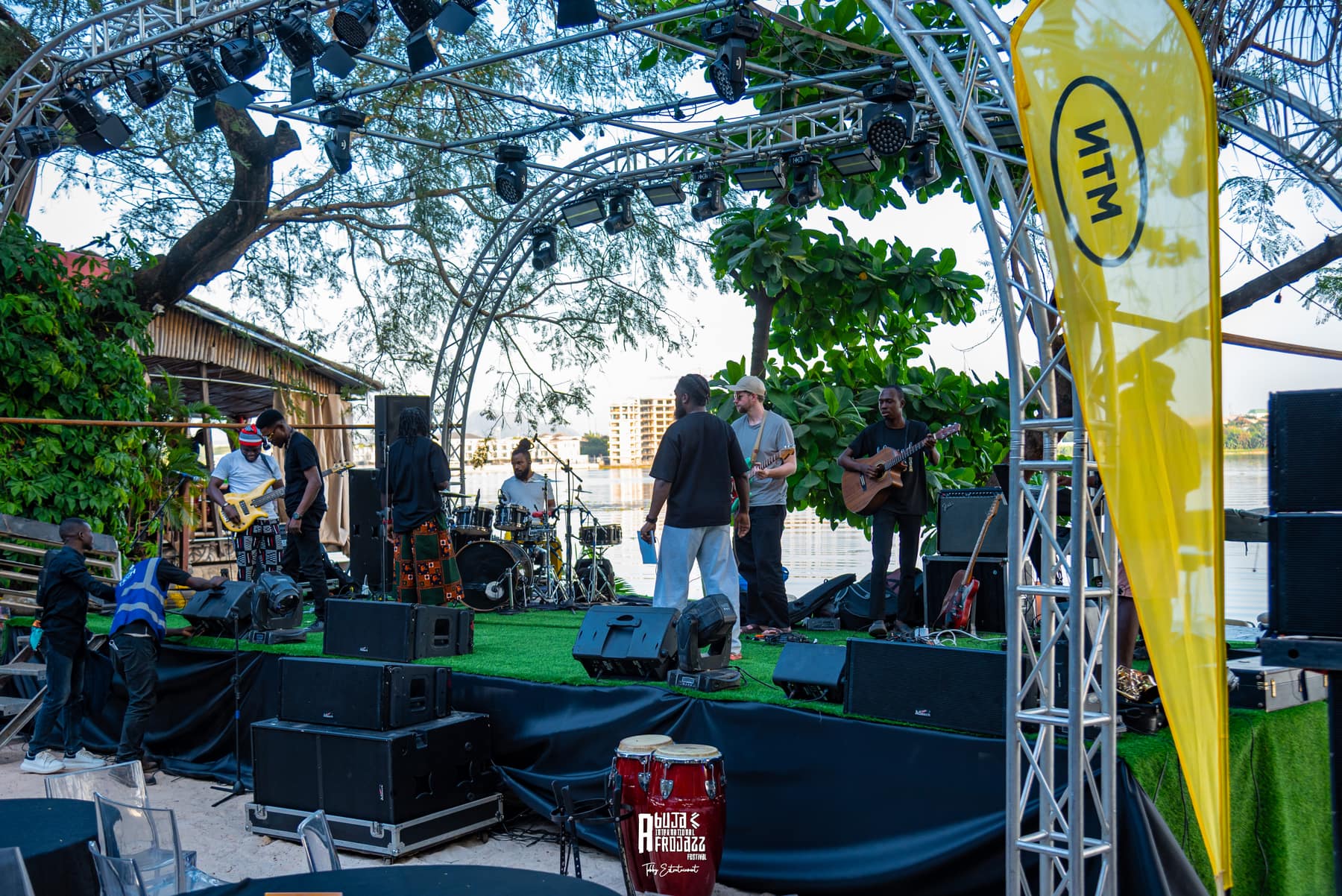 Band performing on an outdoor stage at the Abuja International Afrojazz Festival